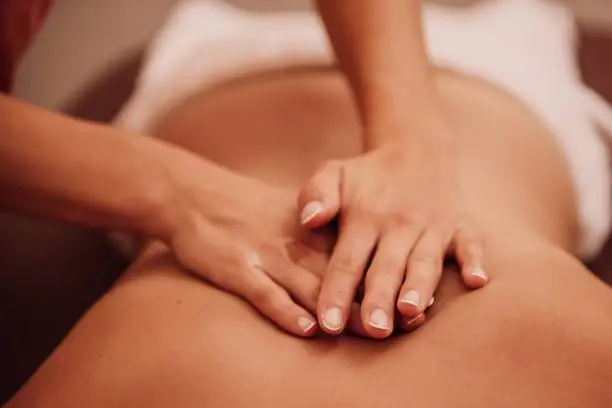 Close-up of Swedish massage technique